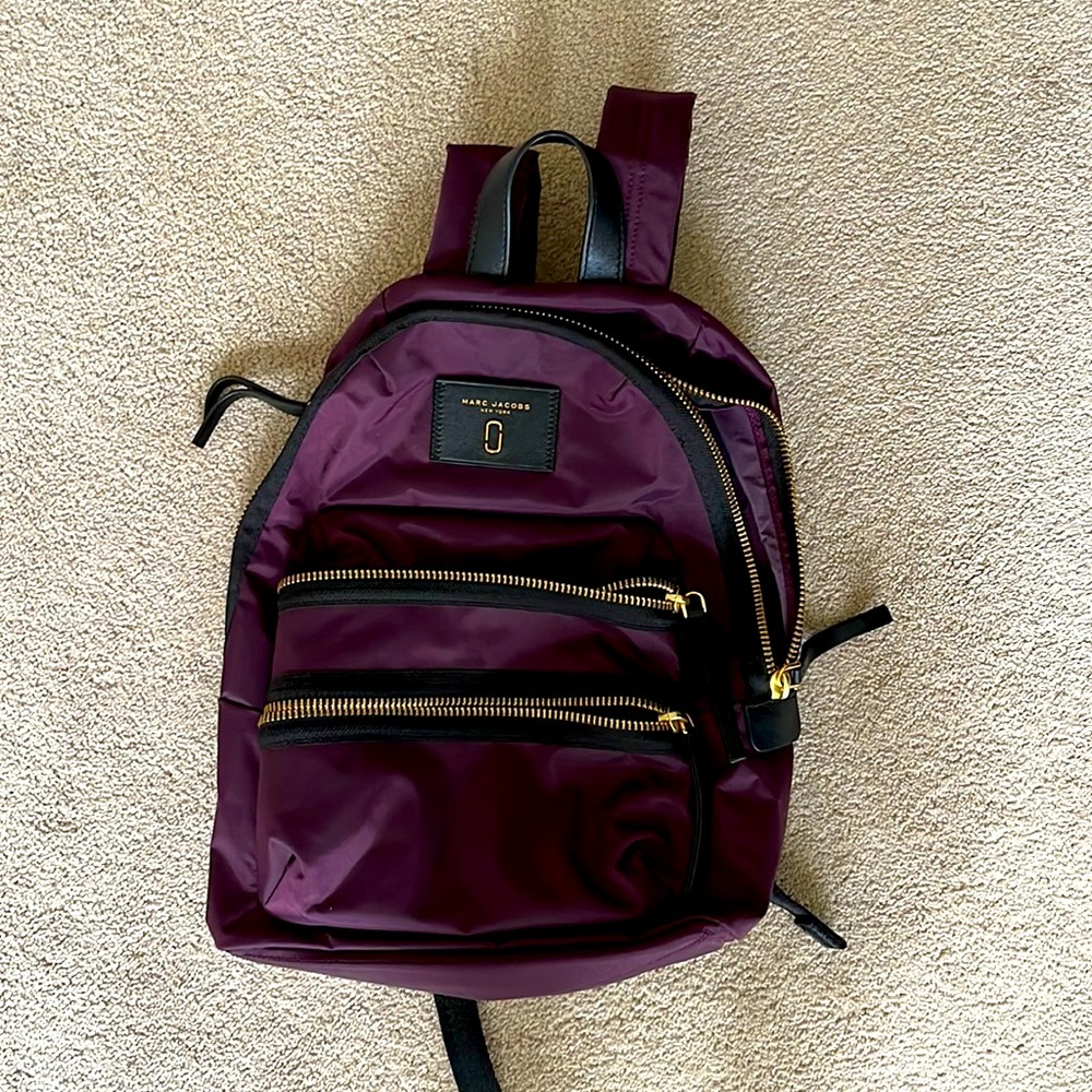 Marc Jacobs New York purple backpack.  Travel in style!